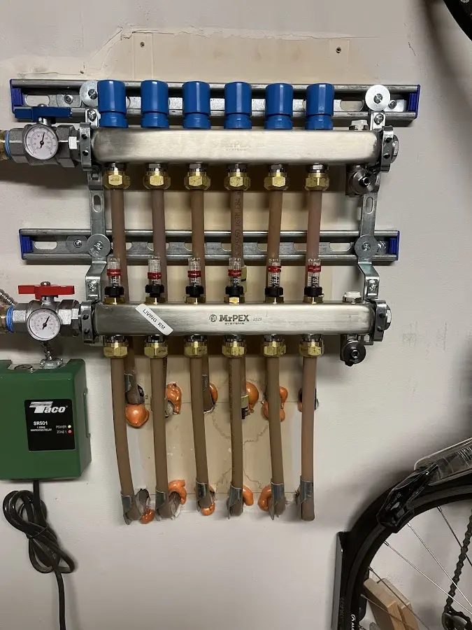 Plumber performing Gas Line Installation at a residential property in Oakmont